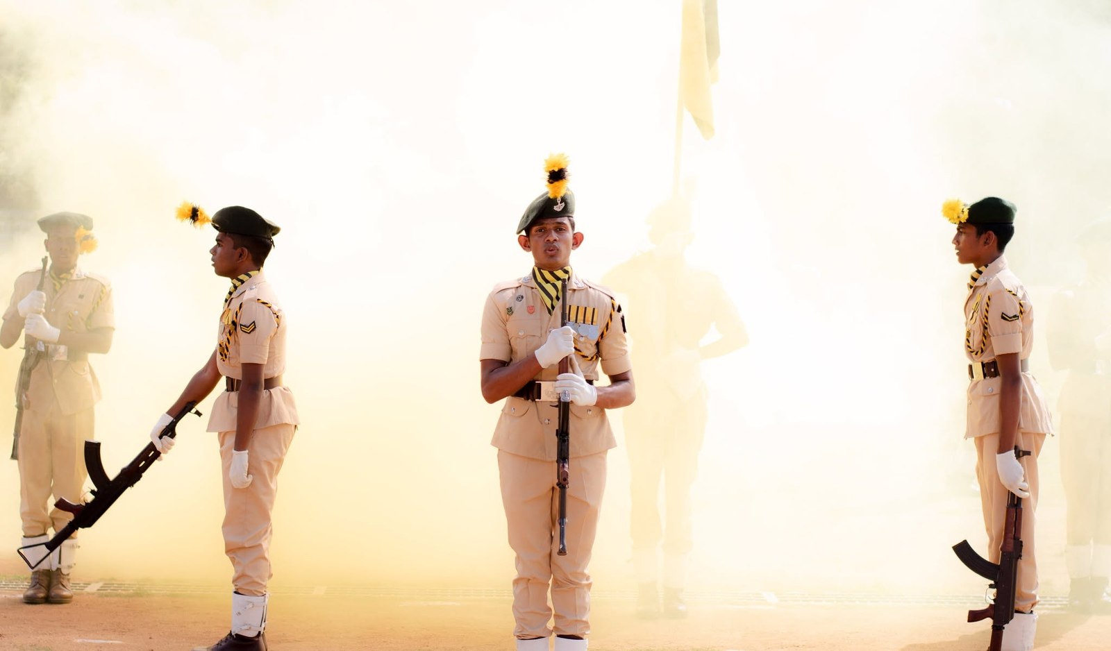 Cadets marching through golden haze at the Interhouse Sports Meet